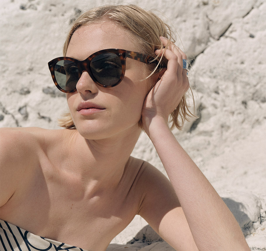 Female Model wearing Oliver Goldsmith Manhattan Cat-eye Sunglasses